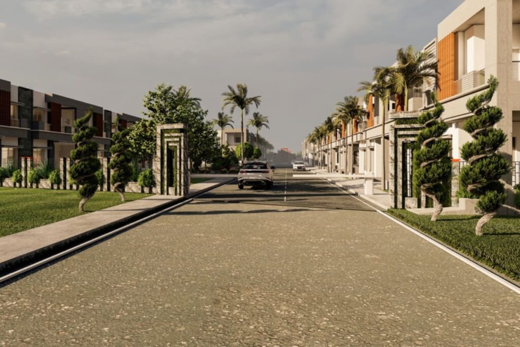 Ansamblu rezidential modern cu locuinte noi, trotuare si copaci verzi